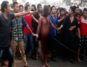 Alleged rapist paraded naked