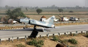 An Indian Air Force (IAF) Mirage -2000 lands at Yamuna Expressway, in Uttar Pradesh on May 20, 2015.