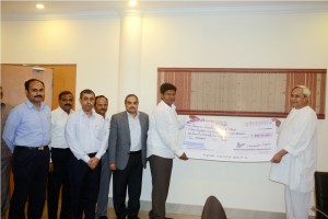 OPGC Dividend cheque for FY 15 being handed over to CM