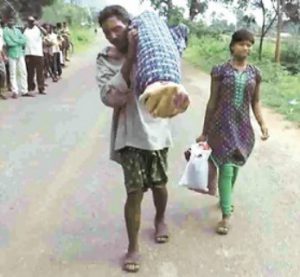 Odisha Tribal Man Carries wife